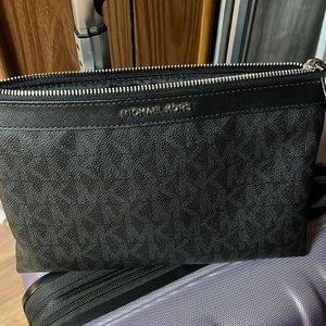 Michael Kors large clutch bag.